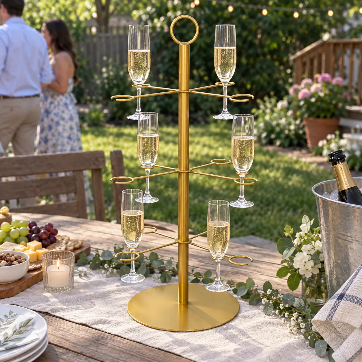 Three-tier cocktail glass tree on a birthday dinner counter