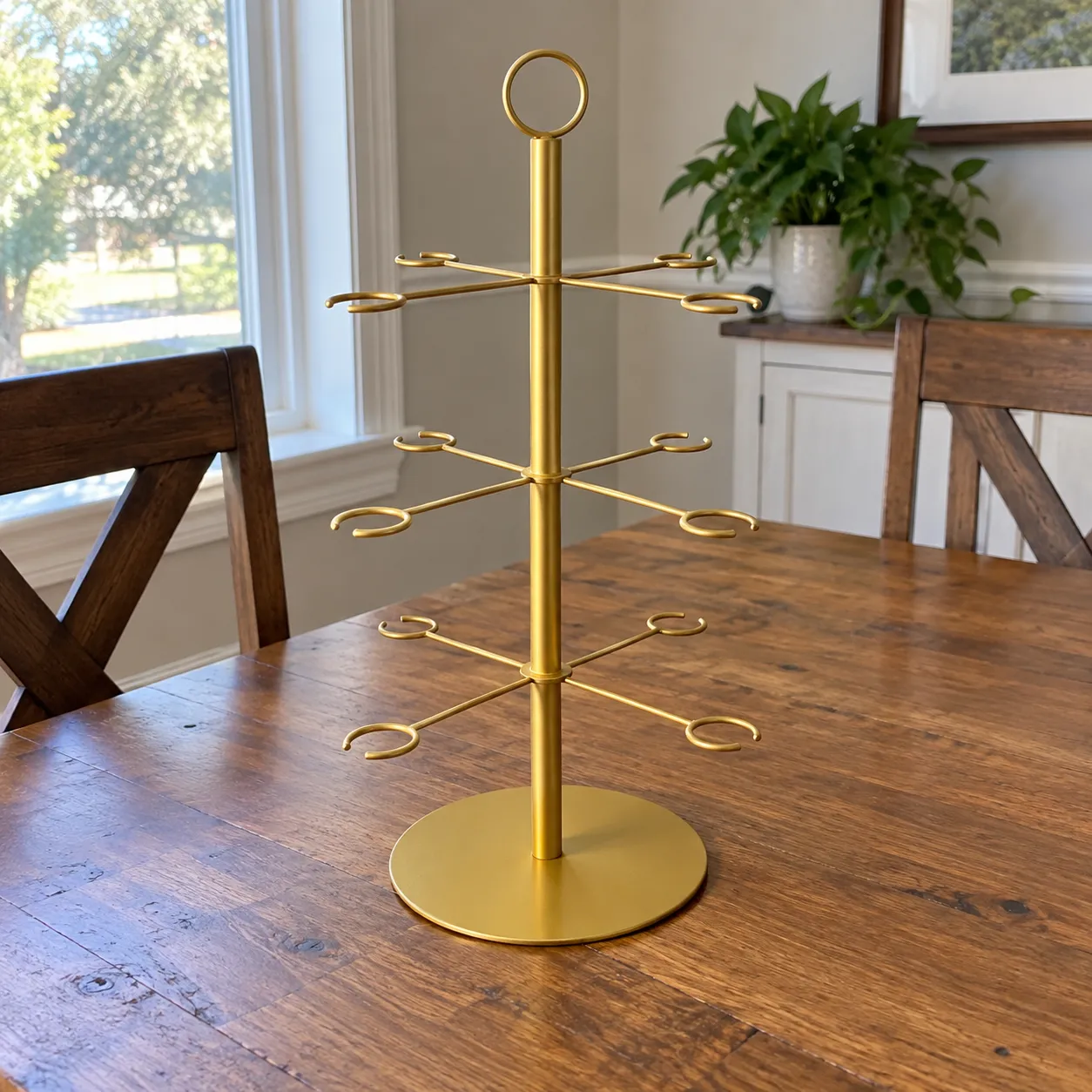 Gold cocktail glass tree at a backyard bridal shower