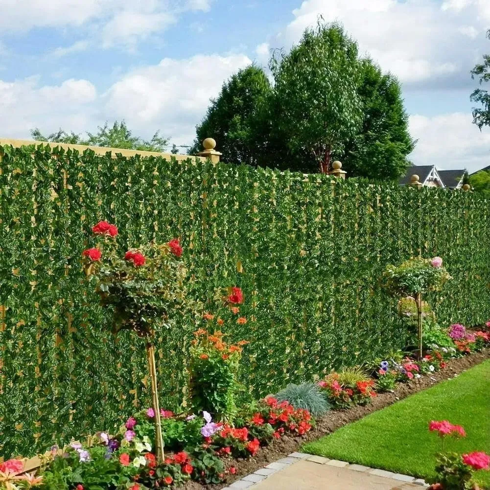 Artificial green privacy foliage creating a garden boundary