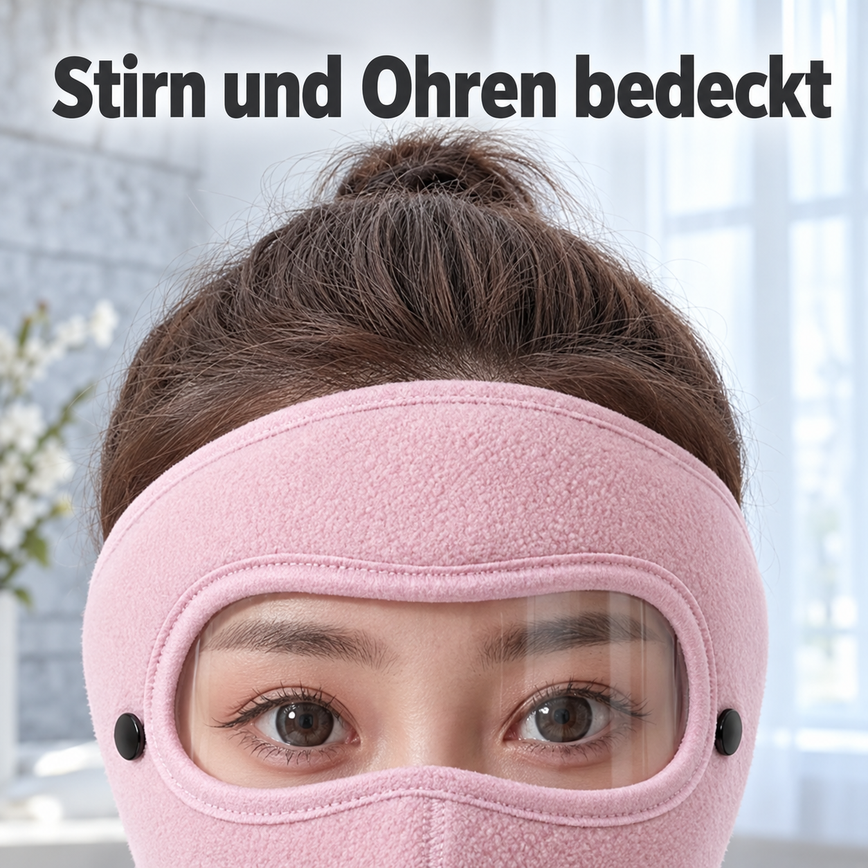 Rosa Kälteschutzmaske mit transparenter Schutzbrille und bedeckter Stirn