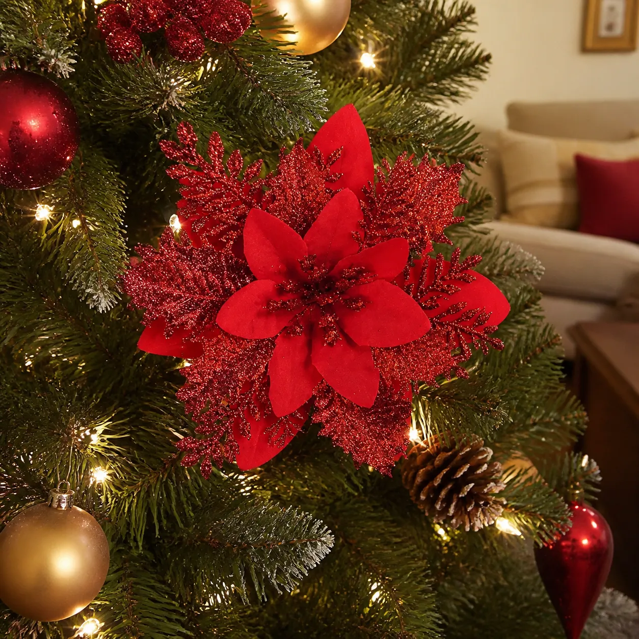 Poinsettia clip on a Christmas tree in a real home