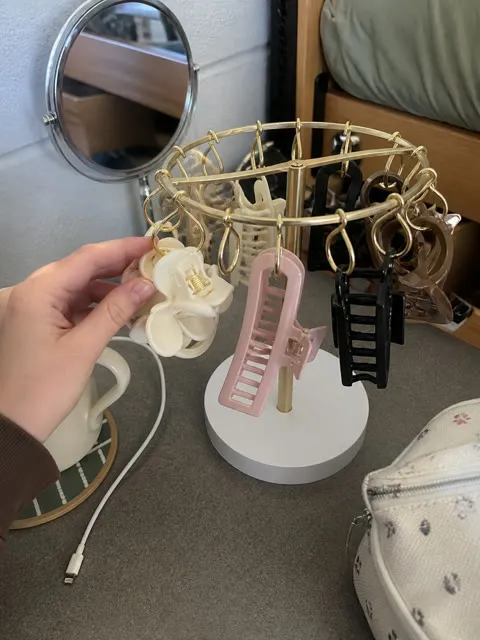 Claw clip organizer on a compact dorm room desk