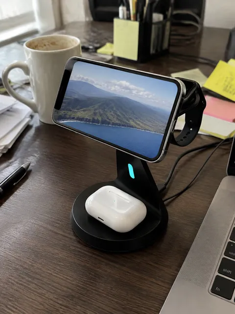 Black charging stand on a casual home-office desk