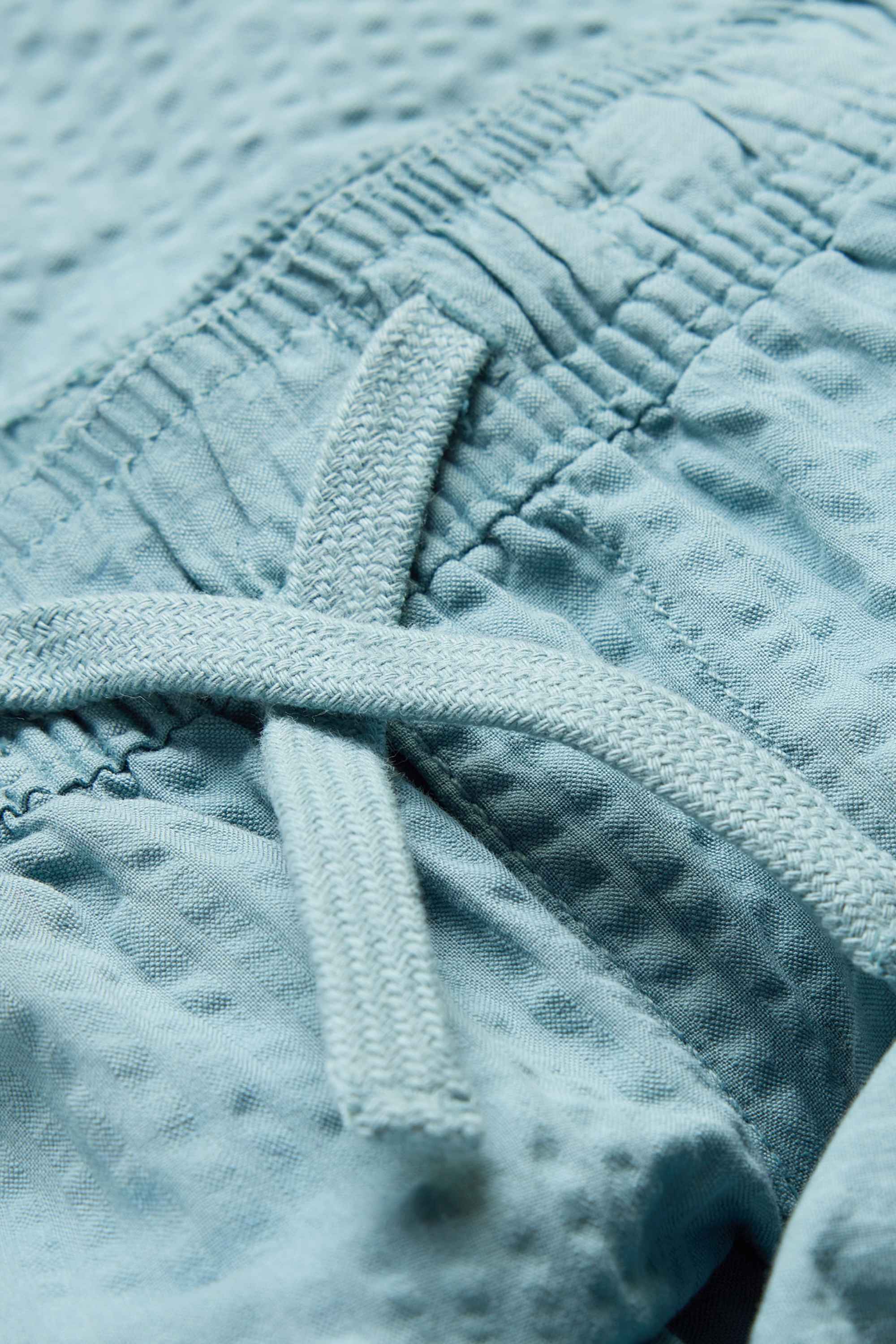 Bermuda shorts - textured light blue