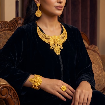 Gold-tone blossom & fringe jewelry set, front view
