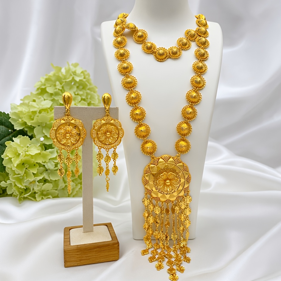 Gold-tone blossom cascade necklace & earring set, front view