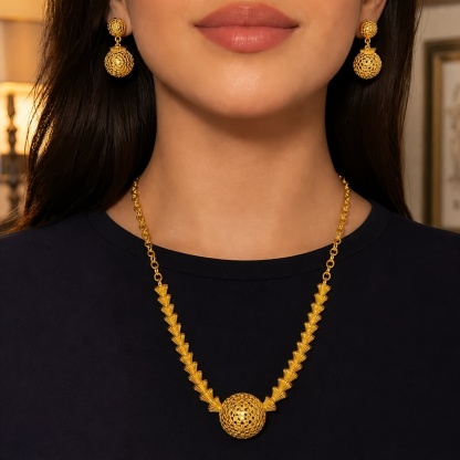 Gold-tone layered geometric disc necklace & earring set, front view