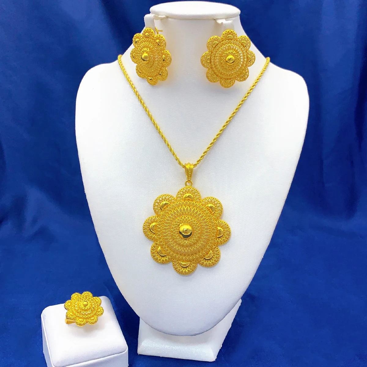 Gold-tone blooming medallion jewelry set, front view