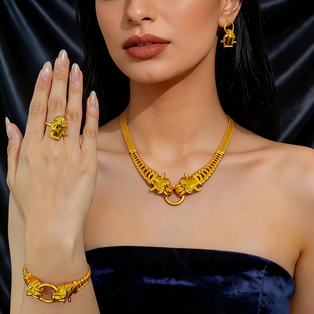 Gold-tone animal link jewelry set, front view