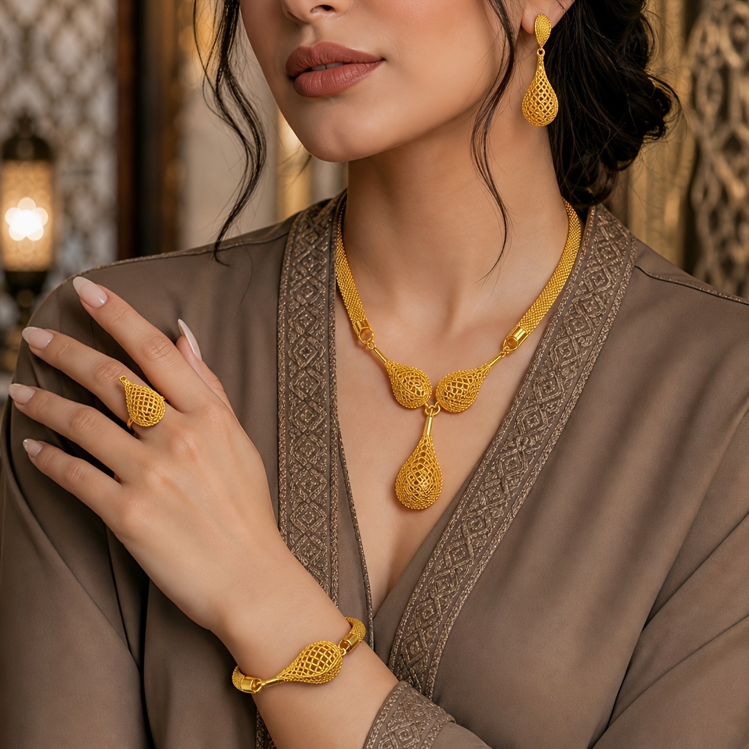 Gold-tone bold round medallion jewelry set, front view