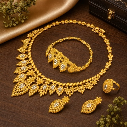 Gold-tone ornate flower jewelry set, front view