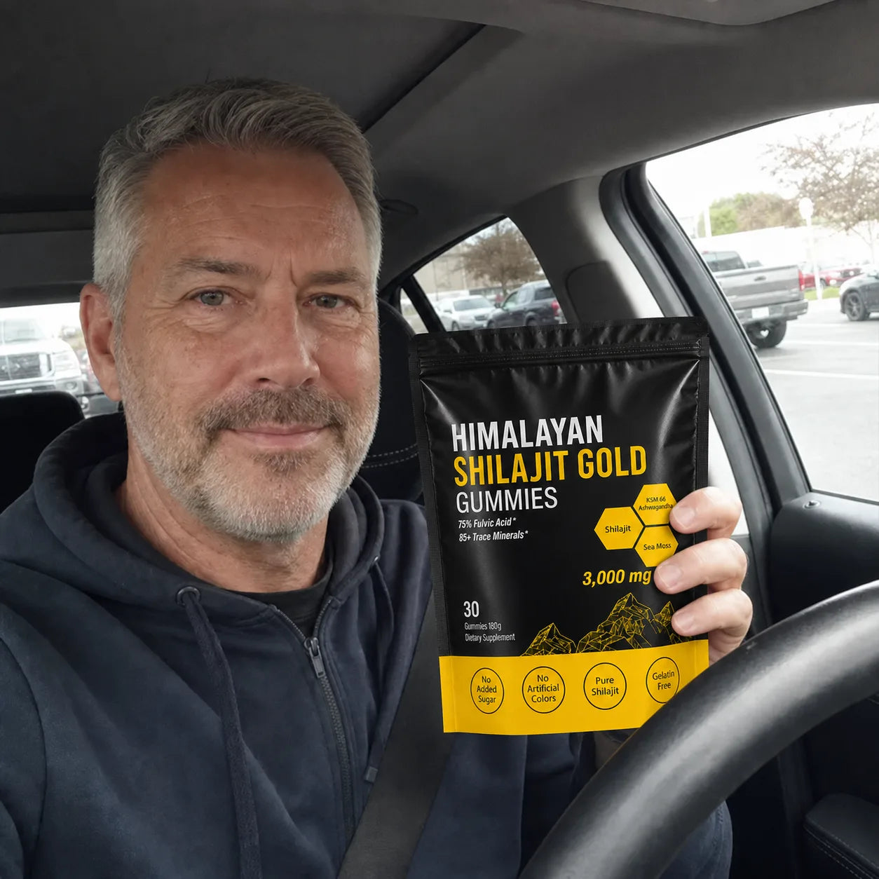 Customer holding MENRYX gummies in a parked car
