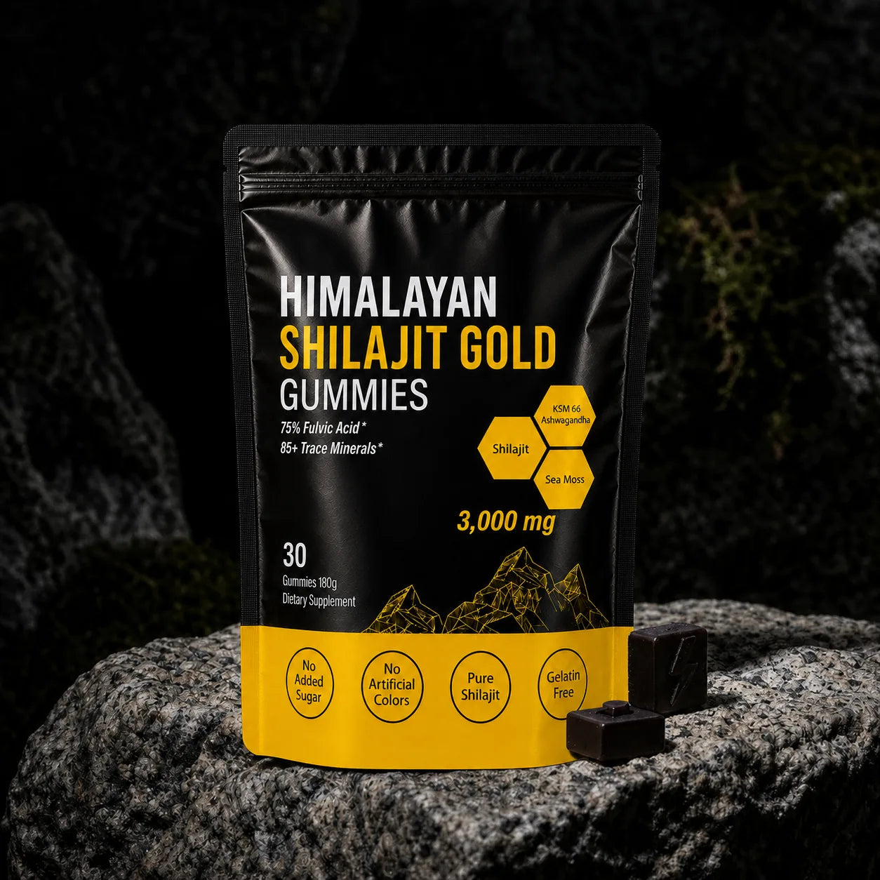 MENRYX Himalayan Shilajit Gold Gummies on a natural rock