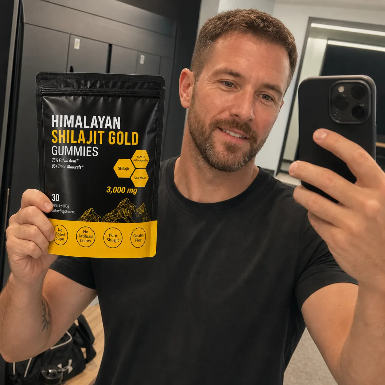 Customer holding MENRYX gummies in a gym