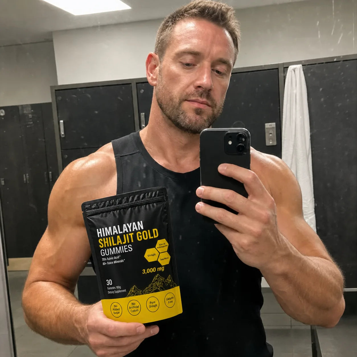 Gym customer holding MENRYX gummies
