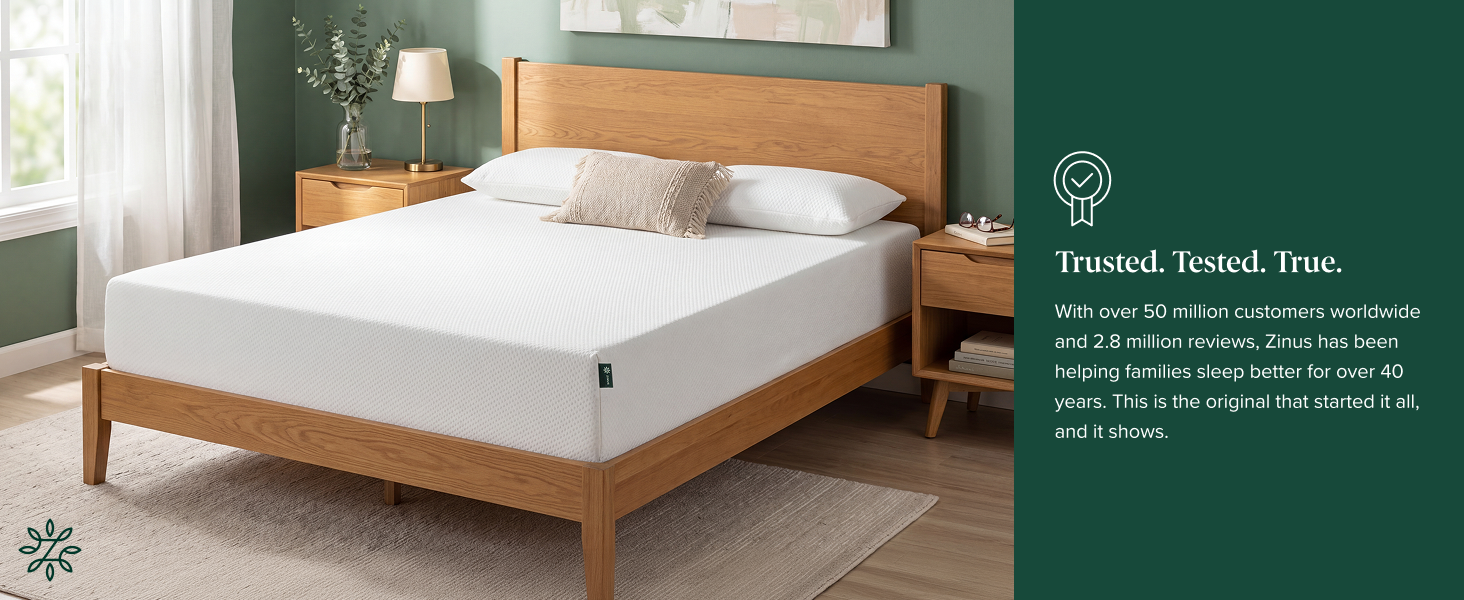 Zinus Green Tea Memory Foam Mattress on a wooden bed frame in a well lit bedroom 