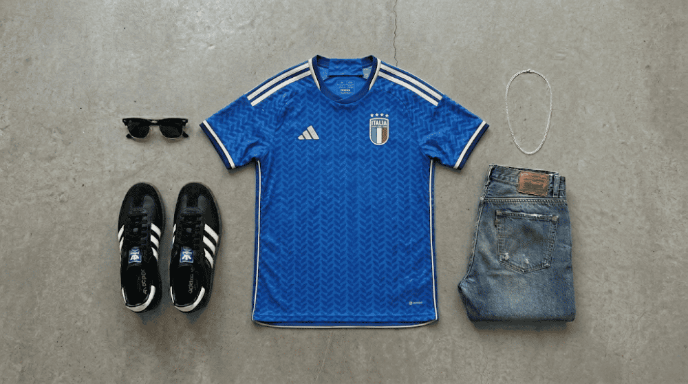 Men styling a slim fit soccer jersey short sleeve with cargo pants and retro sneakers