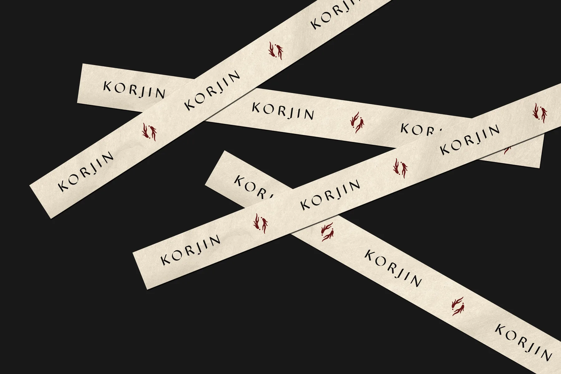 Korjin extract sticks scattered across a black ground
