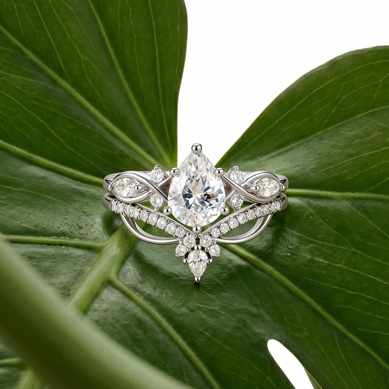 Jeulia Infinity Twist Pear Shaped Engagement Ring Set