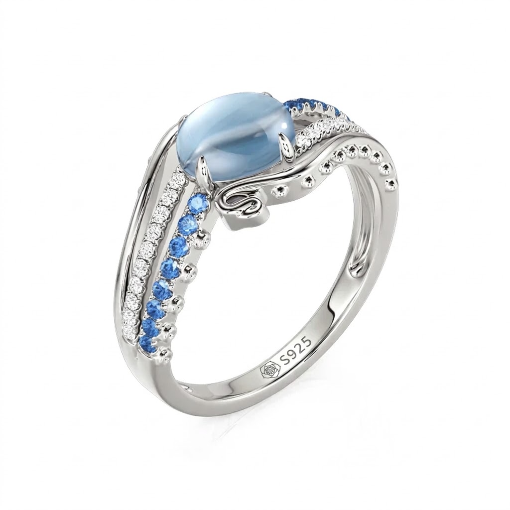 Jeulia Bypass Ocean Wave Oval Blue Topaz Engagement Ring