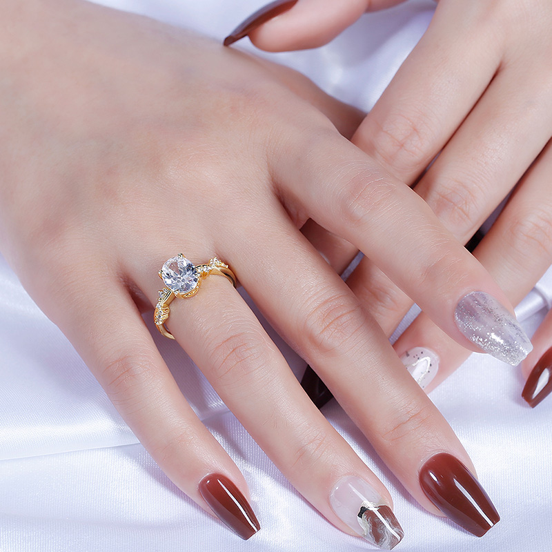 Jeulia 10K/14K/18K Gold Platinum Twist Oval Cut Ring