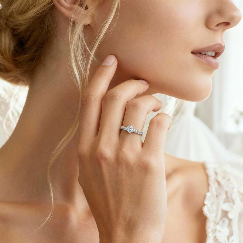 Jeulia Simple Round Cut Promise Ring Twist Design Sterling Silver