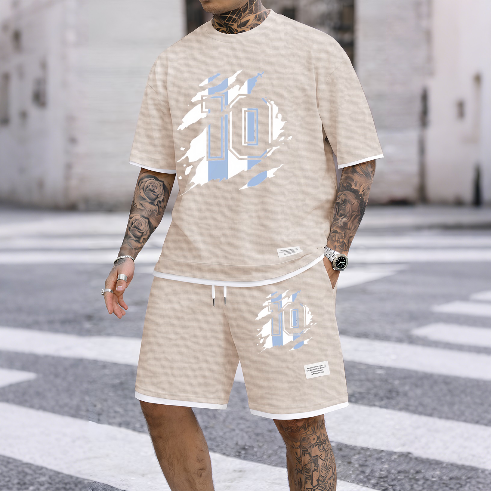 Camisa clásico number 10 estampado drawstring shorts set, suitable for spring and summer wear. This casual summer set includes a de manga corta and shorts, perfect for everyday wear and sports. para hombre