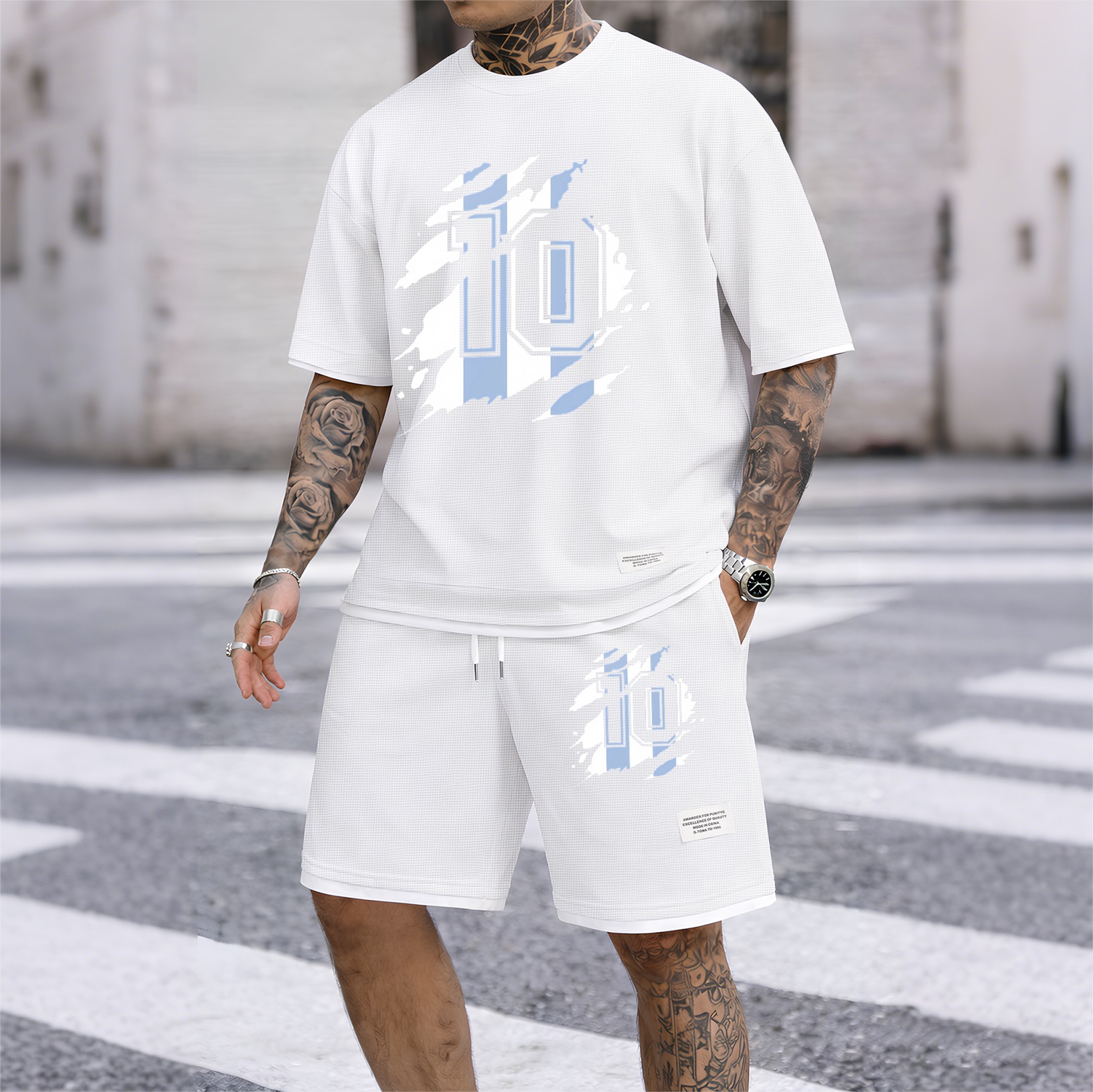 Camisa clásico number 10 estampado drawstring shorts set, suitable for spring and summer wear. This casual summer set includes a de manga corta and shorts, perfect for everyday wear and sports. para hombre