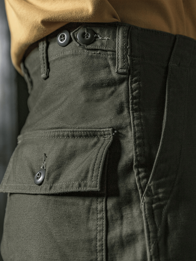 Retro de color sólido Multi-bolsillo Design casual Trousers para hombre