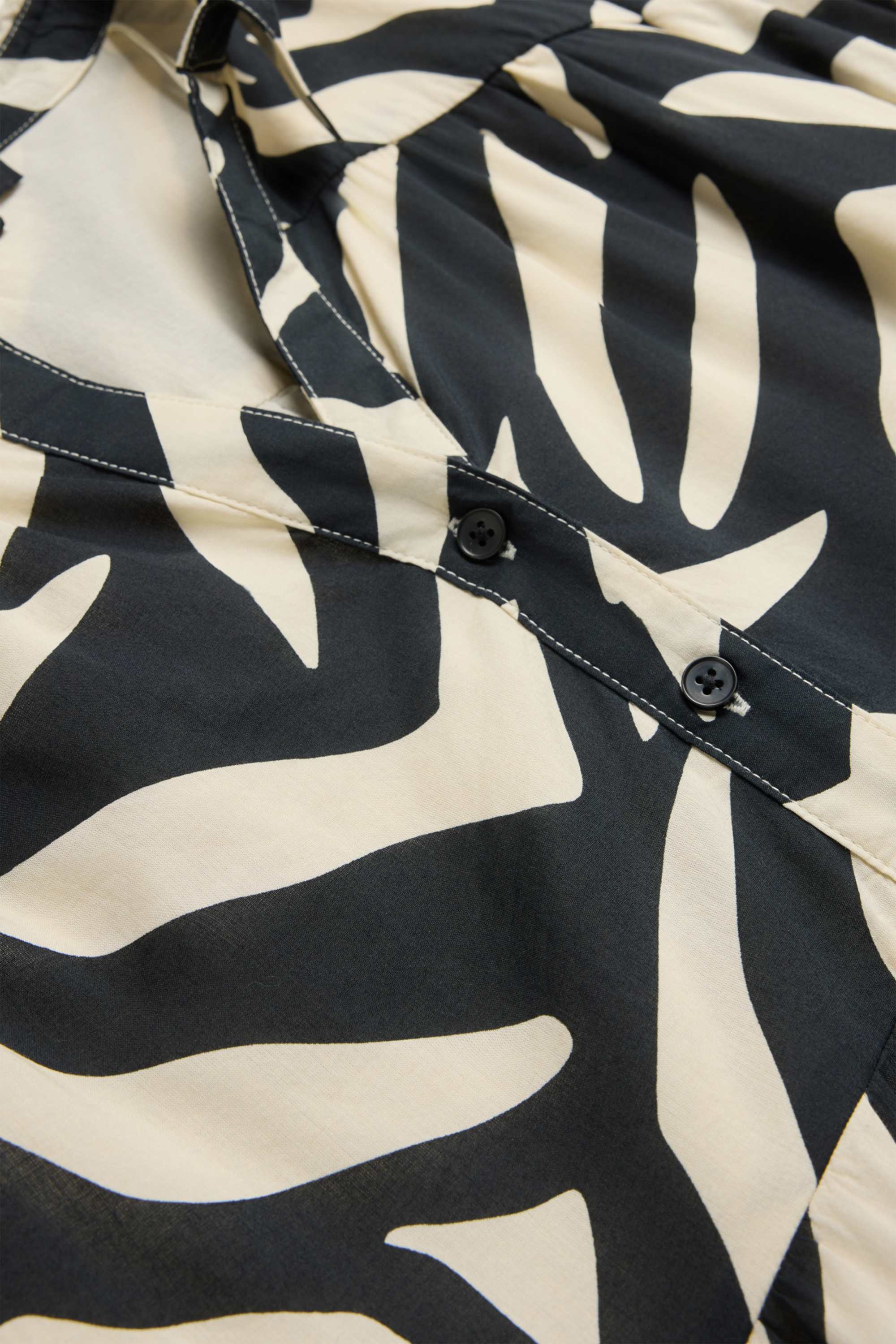 A-line dress - patterned white / black