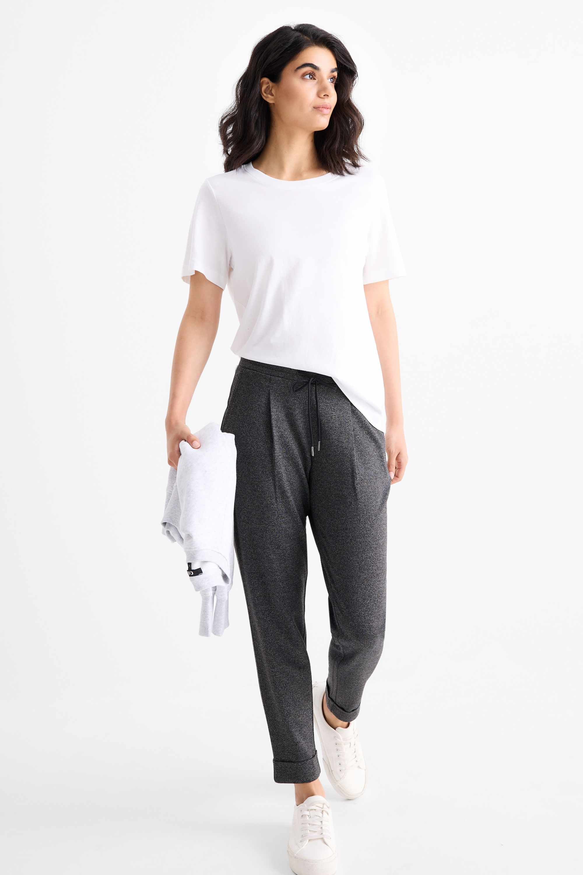 Jersey trousers - mid-rise waist - tapered fit - textured dark gray
