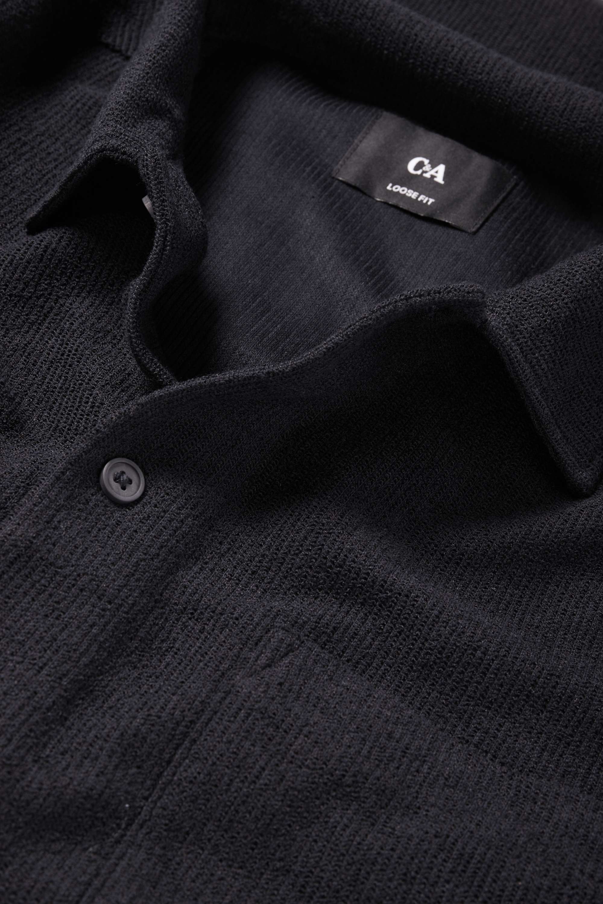 Knitted shirt - loose fit - lapel collar - ribbed black