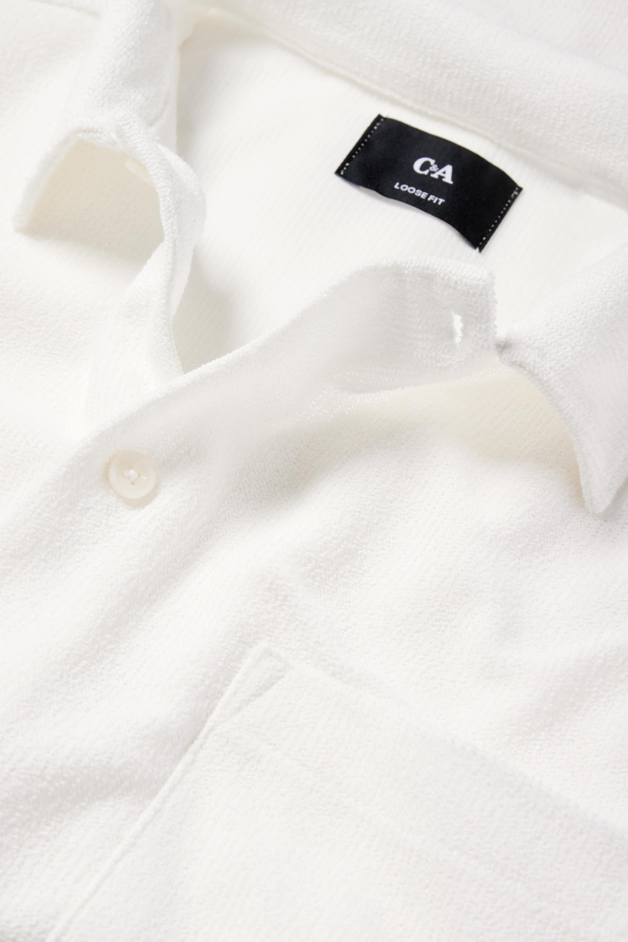 Knitted shirt - loose fit - lapel collar - ribbed cremewhite
