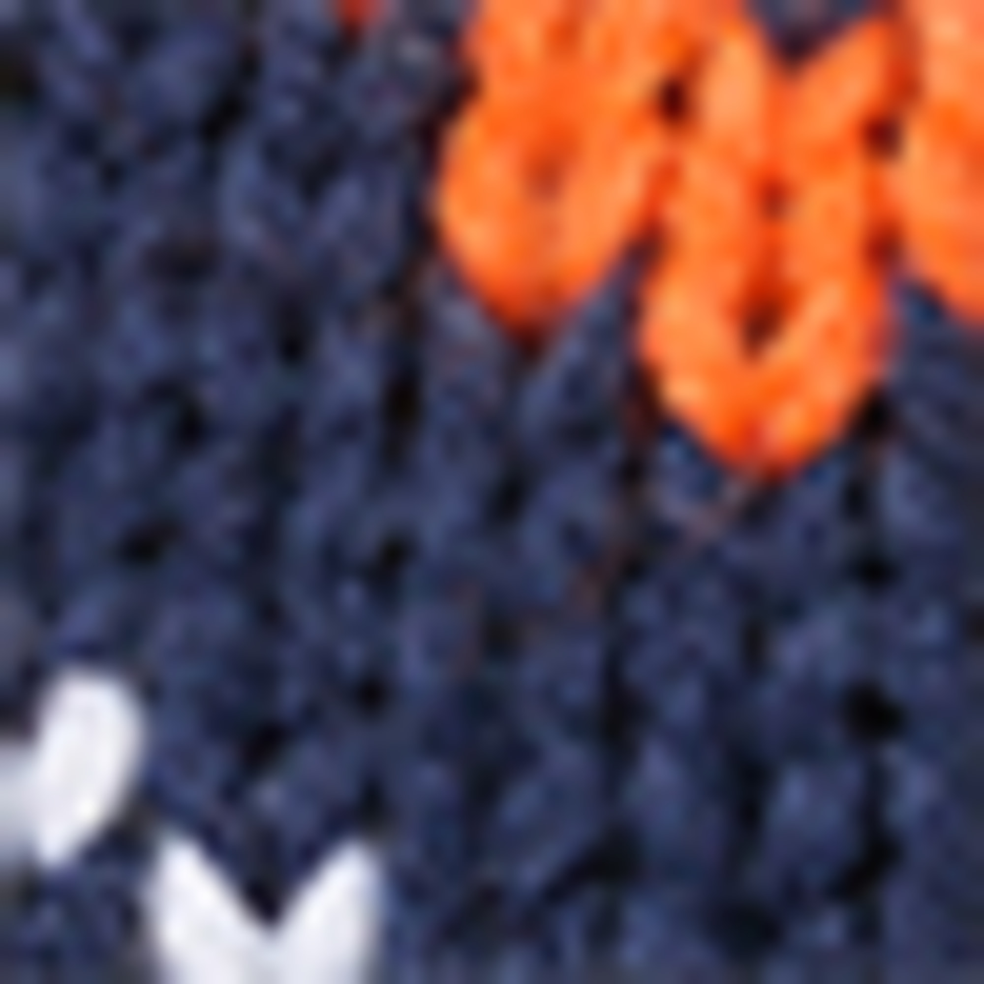 Pom-pom hat - patterned orange