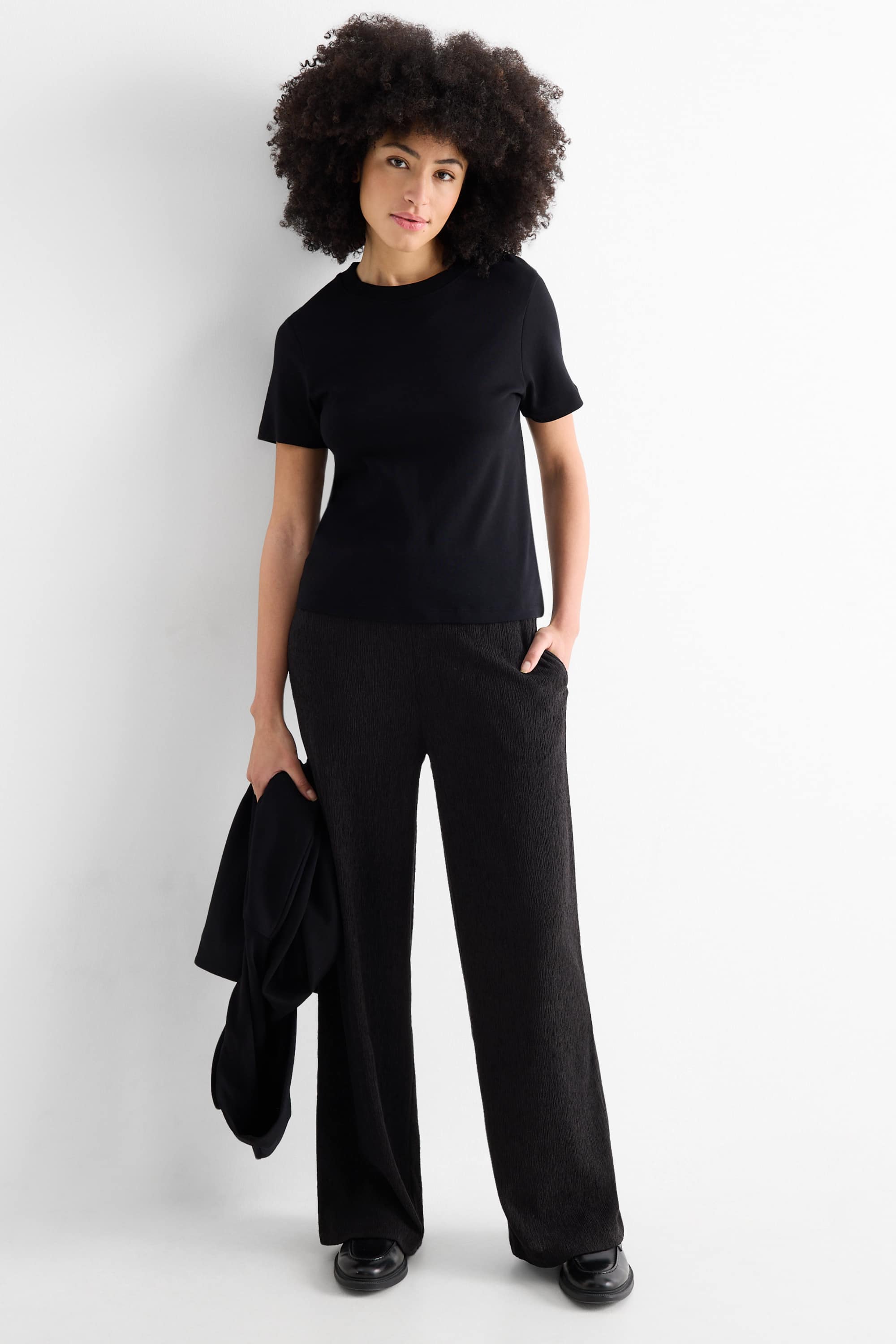 Jersey trousers - mid-rise waist - textured black
