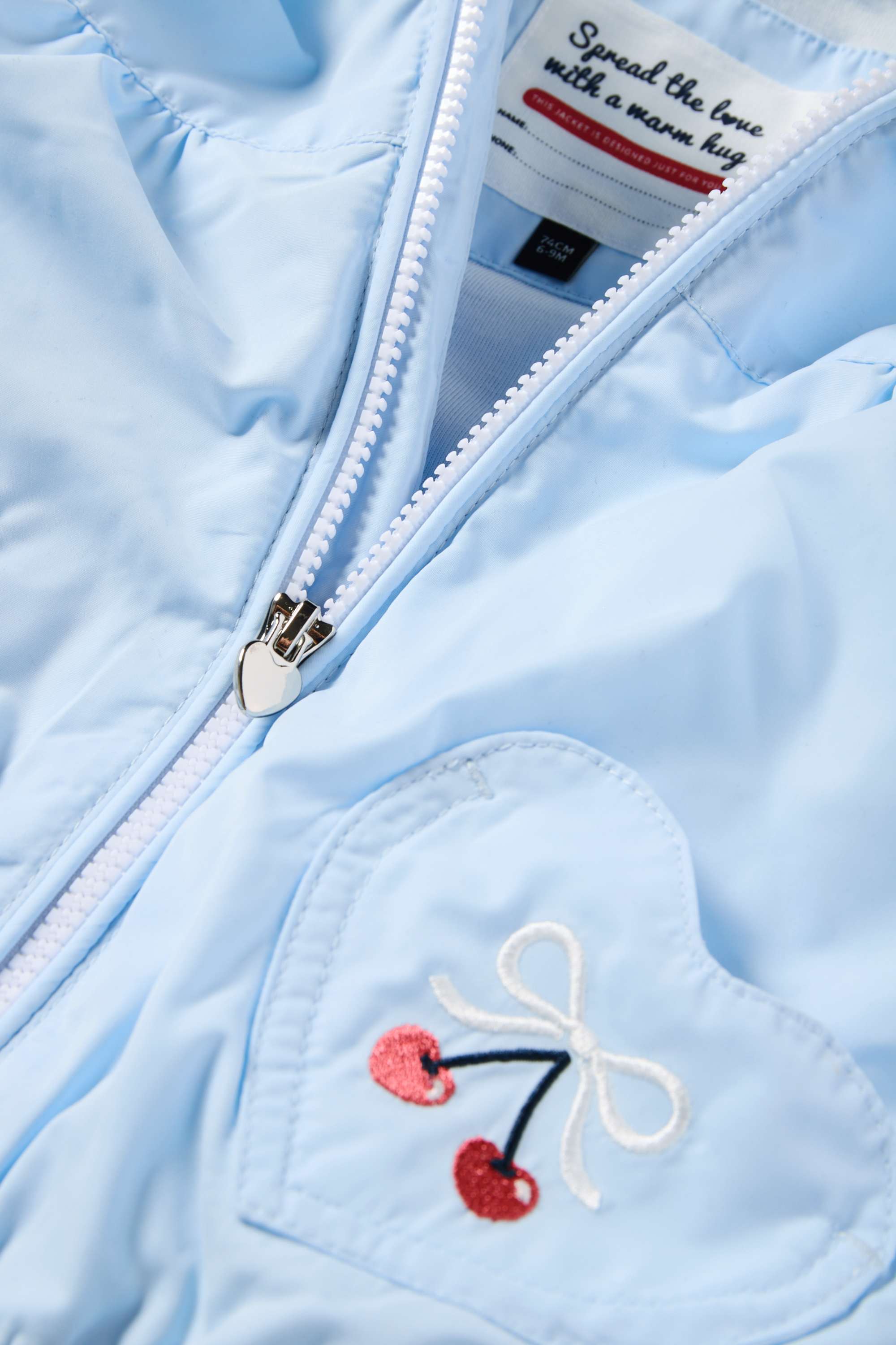 Cherry and bow - baby jacket with hood light blue