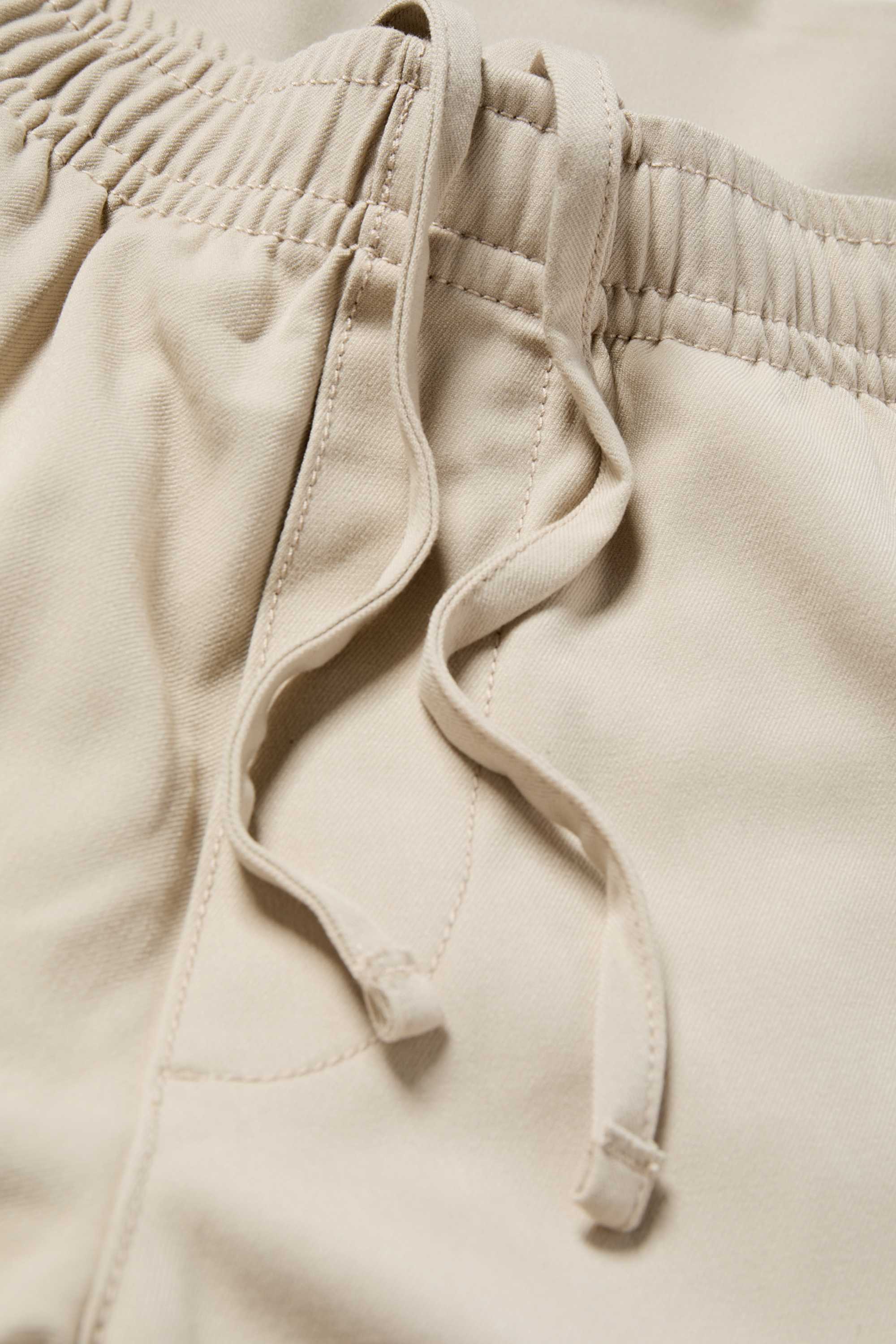 Chinos - tapered fit light beige