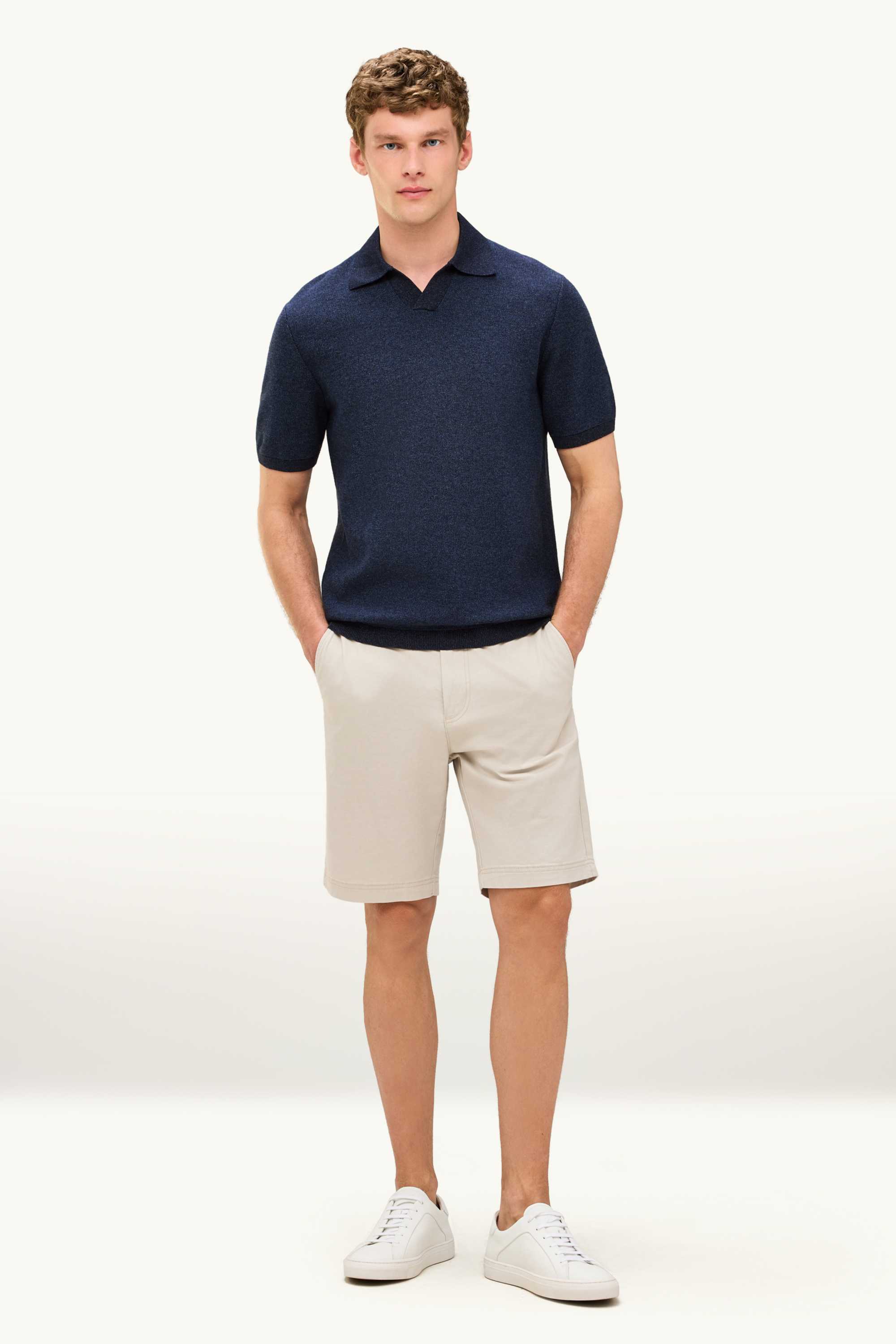 Knitted polo shirt - regular fit - textured dark blue