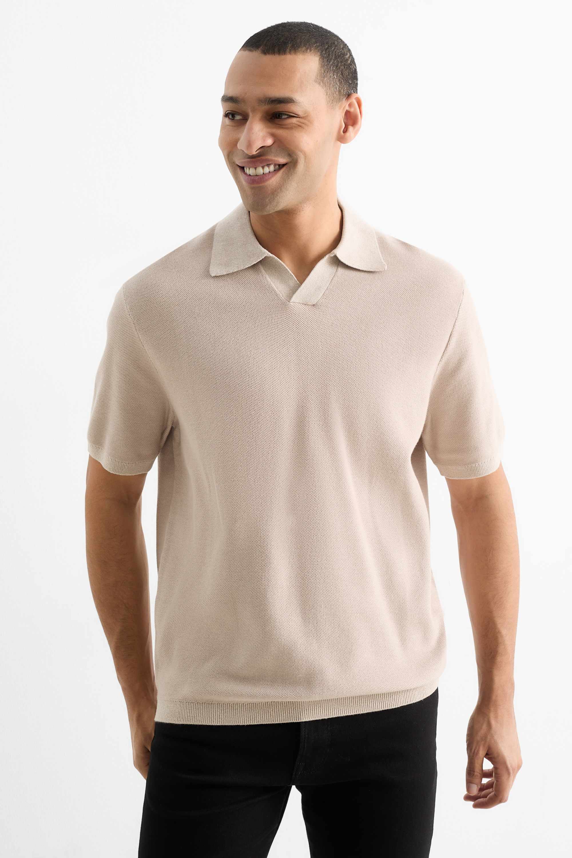 Knitted polo shirt - regular fit - textured light beige
