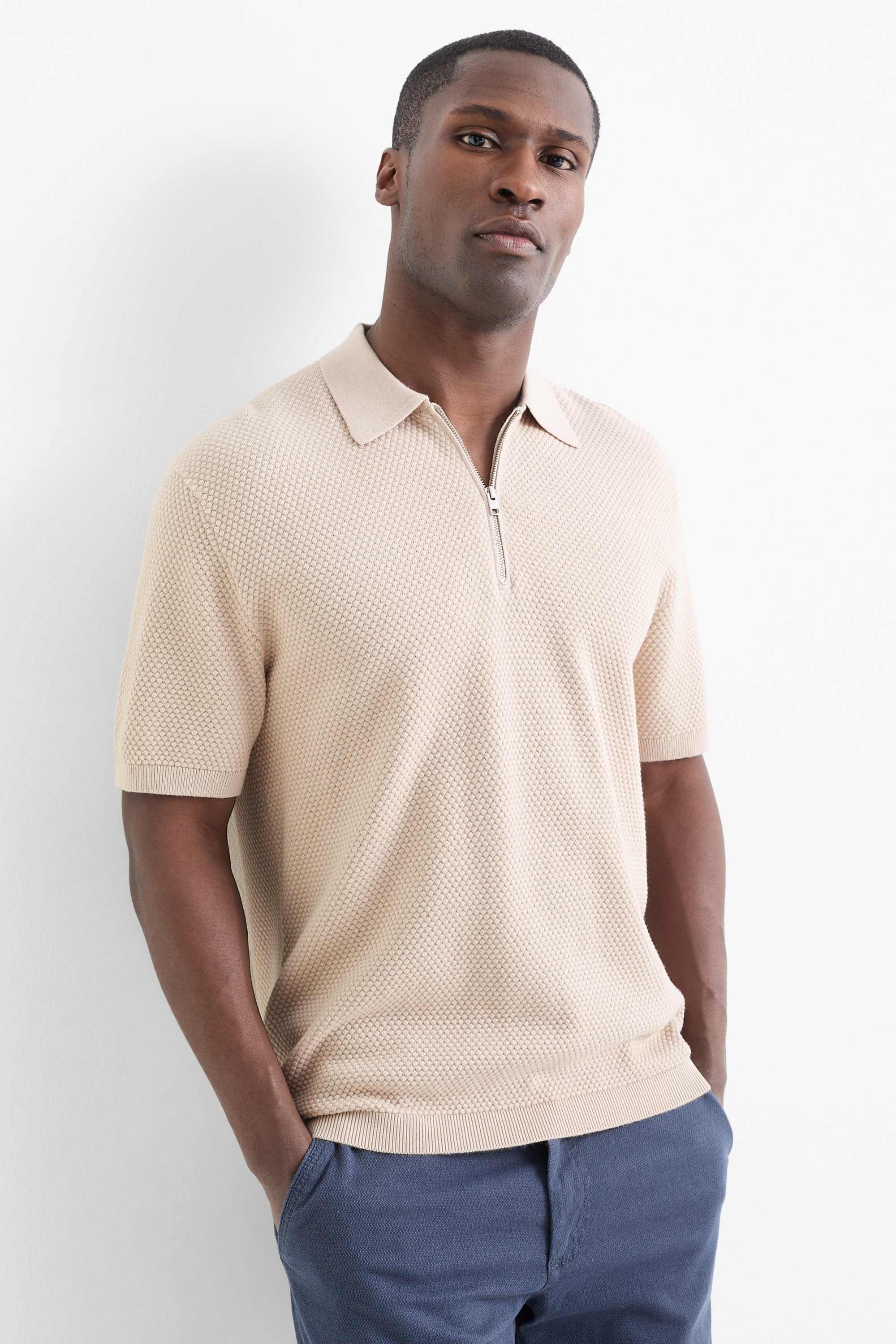 Knitted polo shirt - regular fit - textured light beige