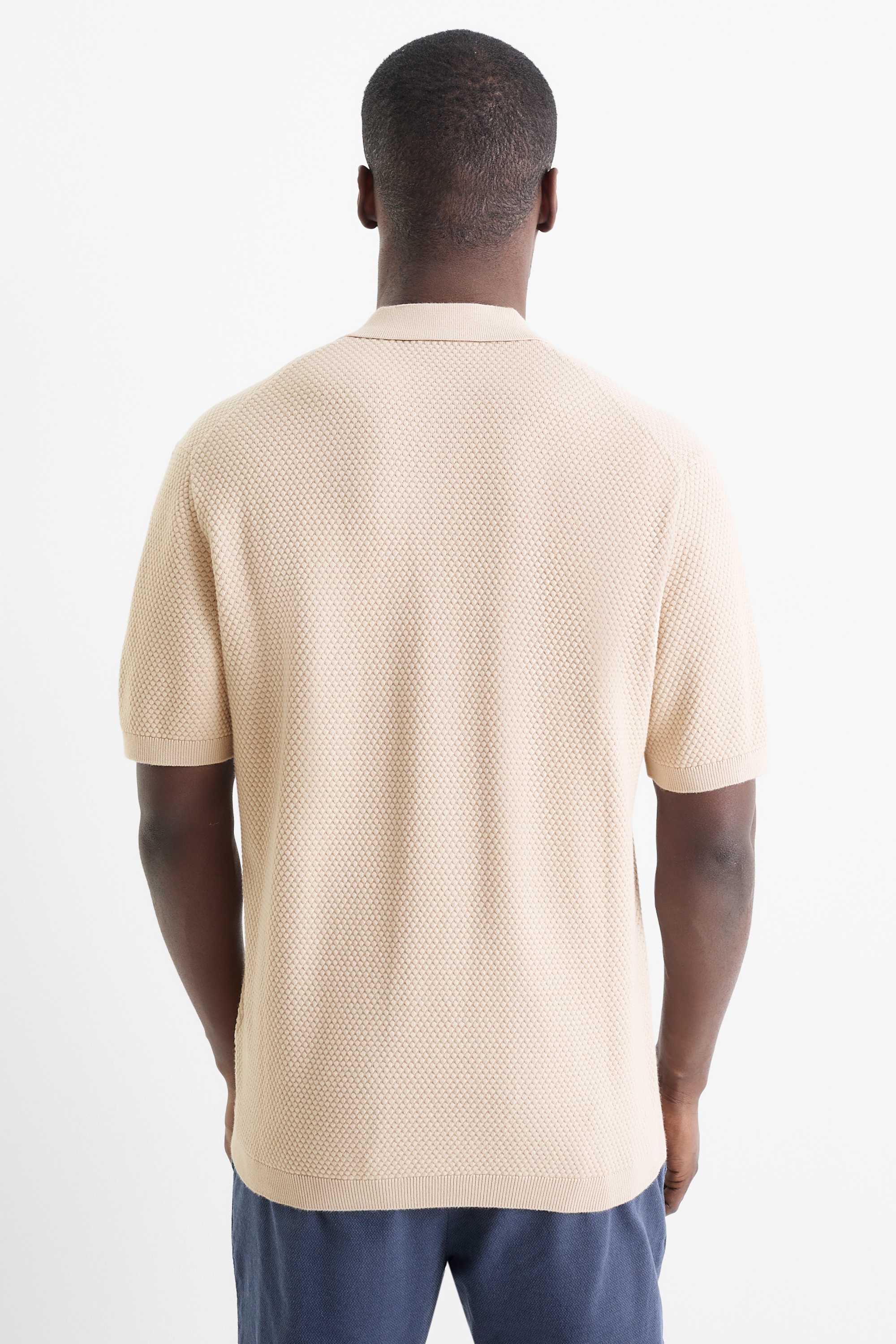 Knitted polo shirt - regular fit - textured light beige