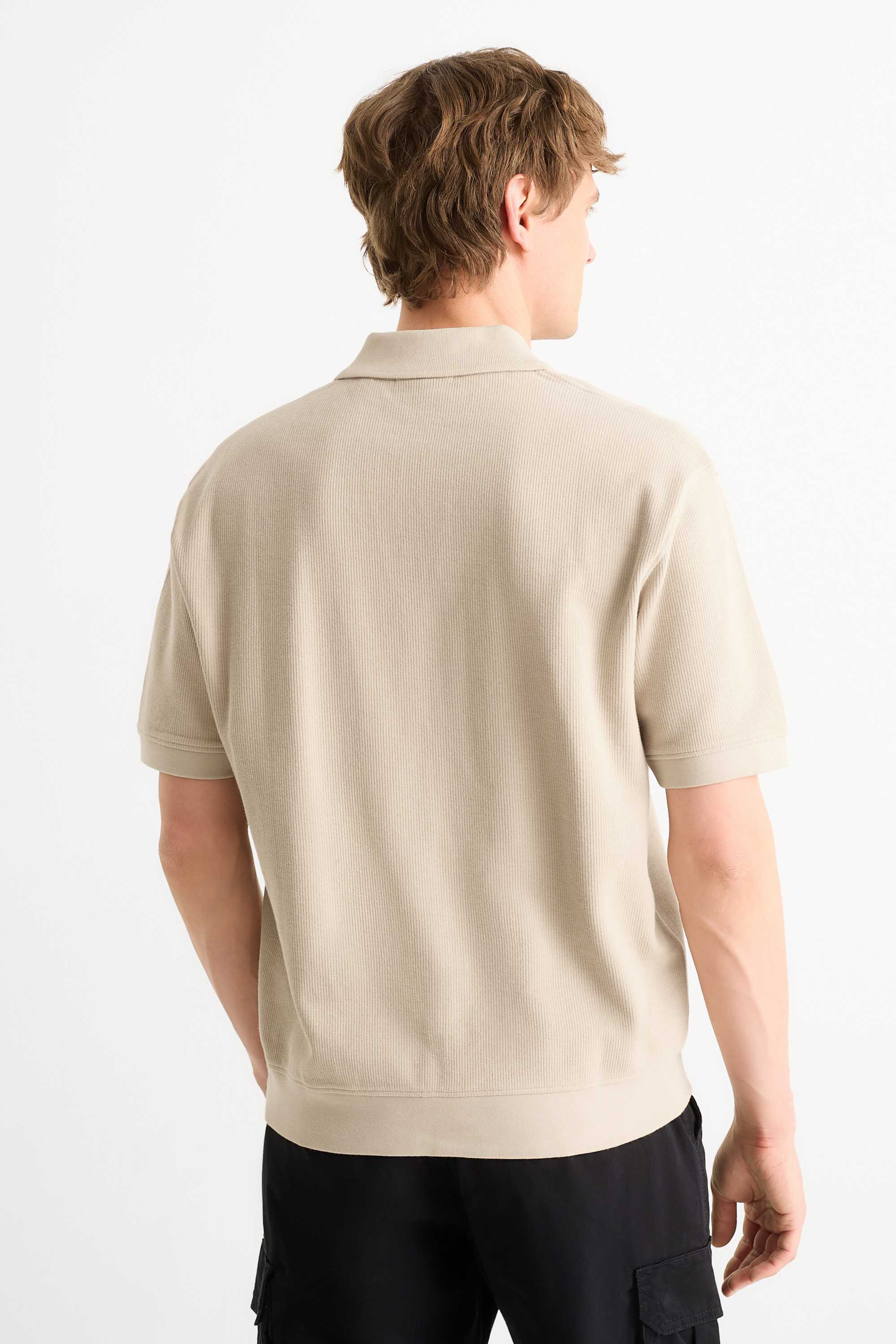 Knitted polo shirt - relaxed fit - ribbed beige