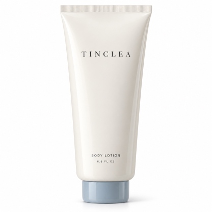 TinClea Body Lotion, Moisturizing preparations for the skin 6.8 fl oz ivory glossy squeeze tube with dusty blue cap on a white background