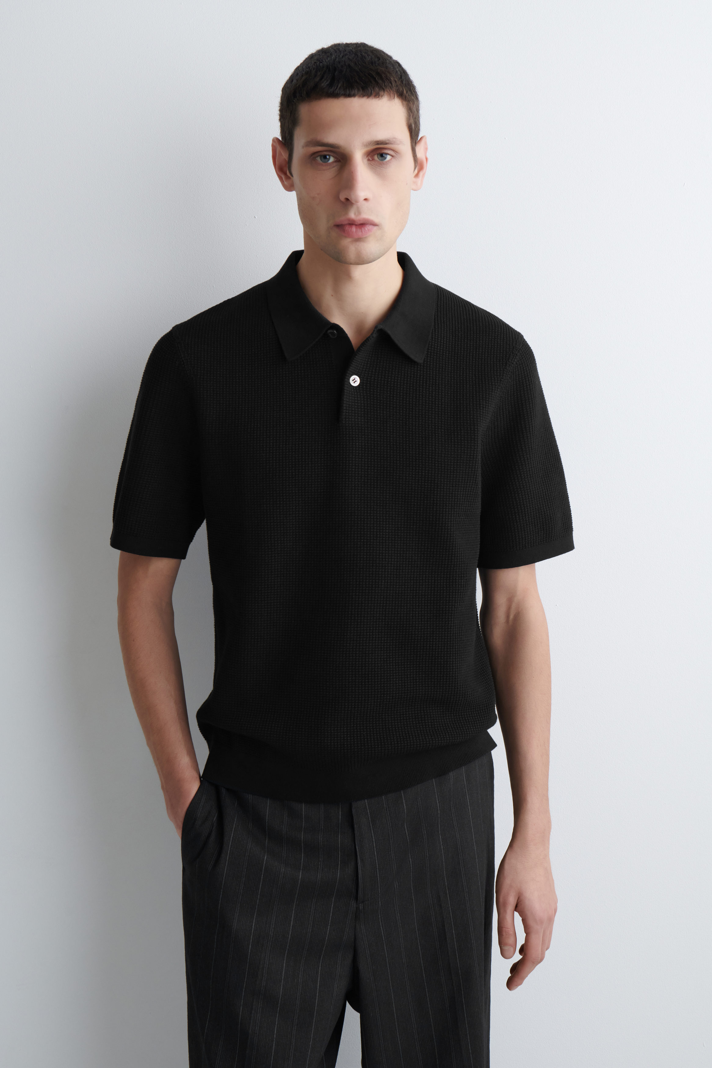 WAFFLE-KNIT COTTON POLO SHIRT - BLACK