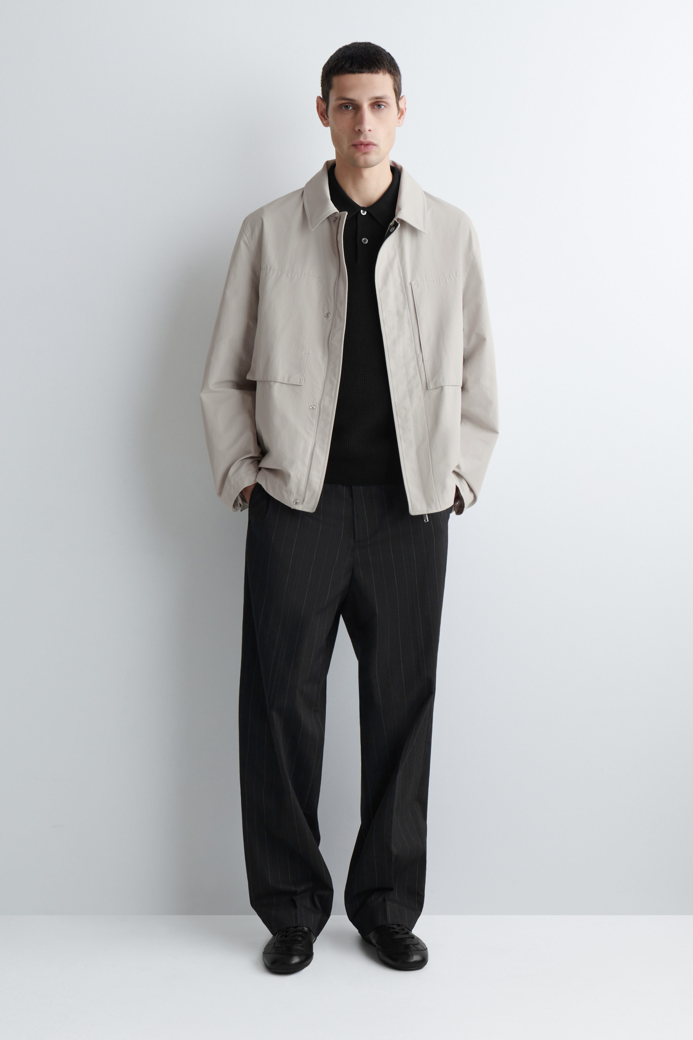 WAFFLE-KNIT COTTON POLO SHIRT - BLACK