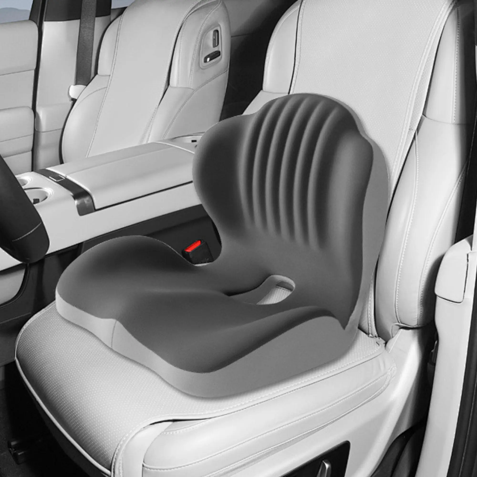 Gray seat cushion positioned in a car seat