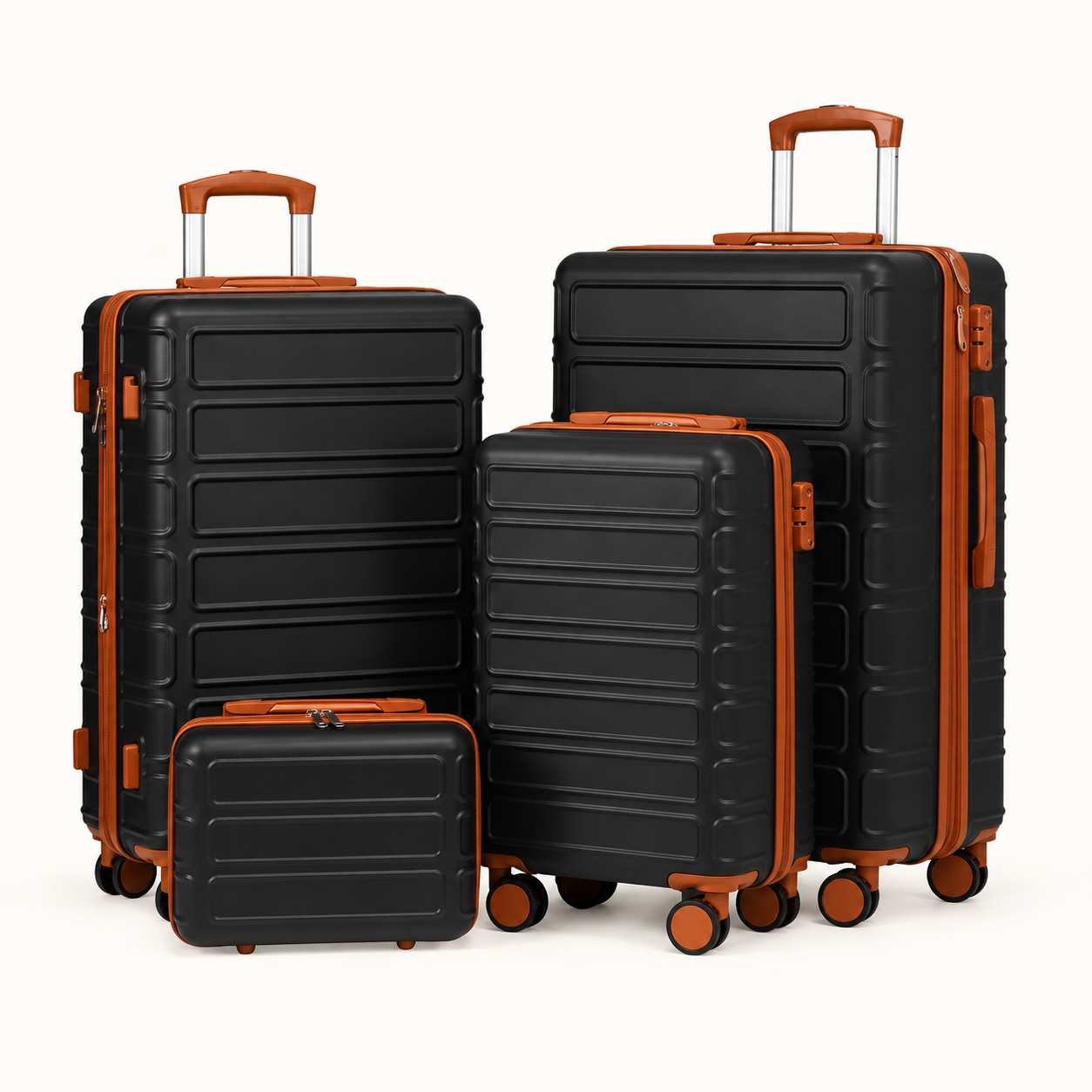 Four-piece black hard-shell luggage set with brown trim