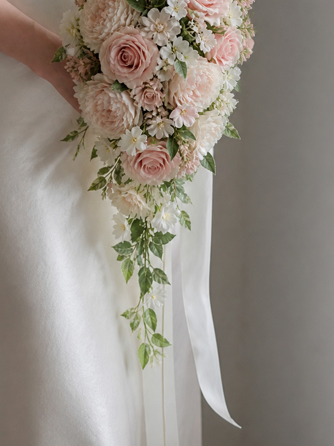 Elegant pink cascade wedding bouquet for bridal styling