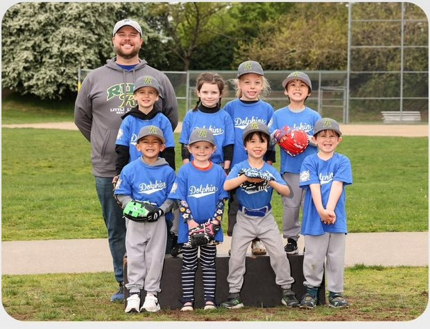 Andrew Green with the tee-ball team he coaches