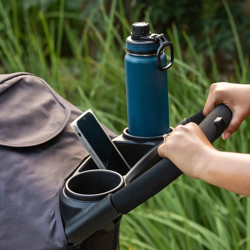 Cochecito con cabina Comfort Cabin, capota con cremallera completa para protección solar y cesta de almacenamiento grande.